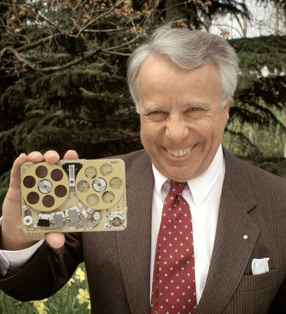Polish-born engineer Stefan Kudelski and the famous Nagra 5N recorder he started developing for the US White House in 1960. (Photo by Jean-Pierre Fizet/Sygma/Sygma via Getty Images)